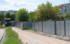 Drogowcy kładą pierwszą warstwę asfaltowej nawierzchni. 1